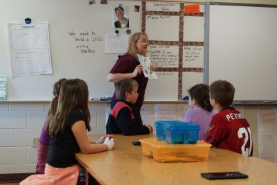 Mrs. Kazmierczak giving instruction to second-grade STEM students.