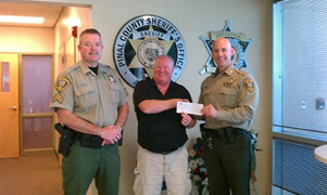 Sgt Jim Meadows, Larry Ramirez, Sheriff Paul Babeau MSM Community Schools Receives $2000 from PCSO.jpg
